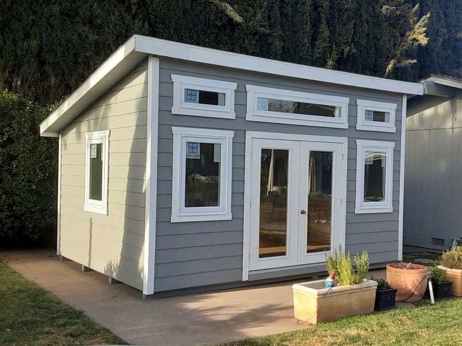 The Modern Studio, a single-slope studio with French doors, transom windows and white trim